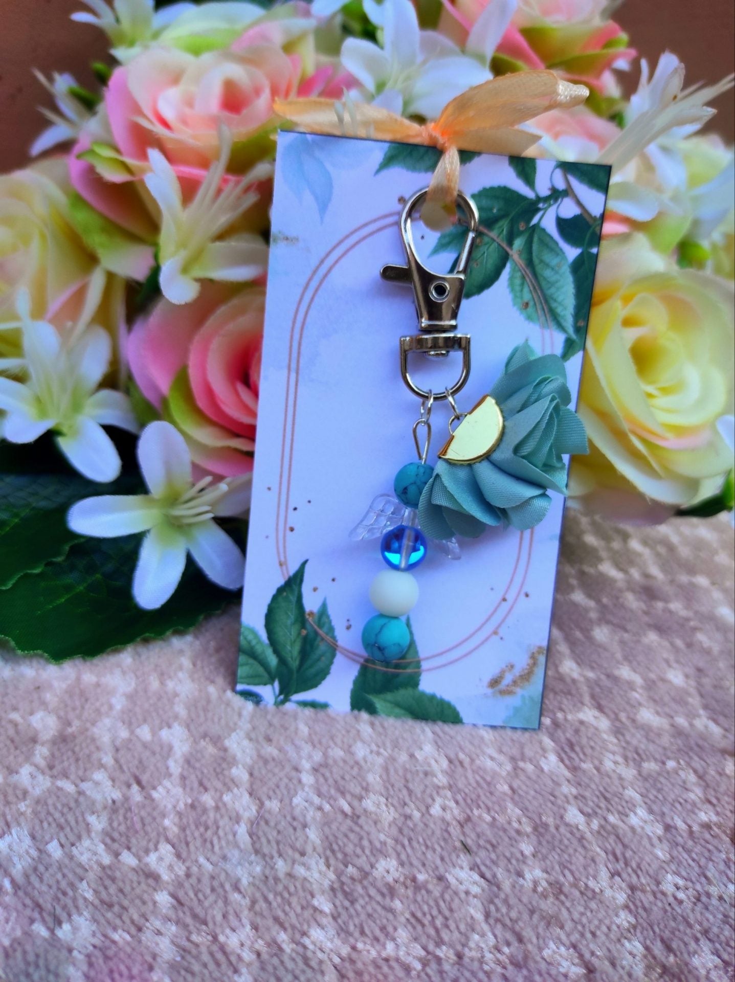 Türkiz angyalos táskadísz holdkővel